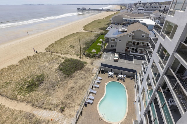 aerial view of extended coastline and a pool