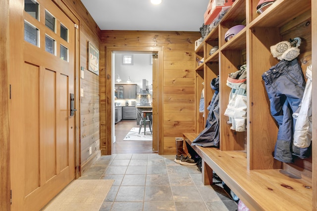 28 Fisher Rd, Newry, ME 04261 - mudroom with wooden walls and stone finish flooring