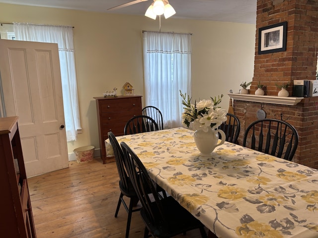 111 Town Farm Rd, Farmington, ME 04938 - dining space featuring hardwood / wood-style floors and a ceiling fan