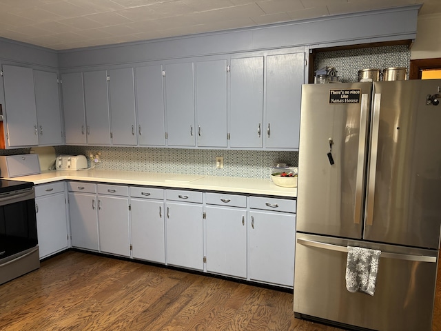 111 Town Farm Rd, Farmington, ME 04938 - kitchen with stainless steel appliances, dark wood-style floors, light countertops, and gray cabinetry