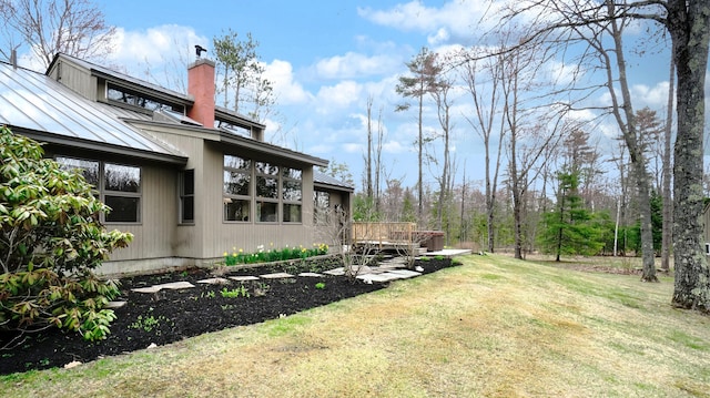 view of yard featuring a wooden deck
