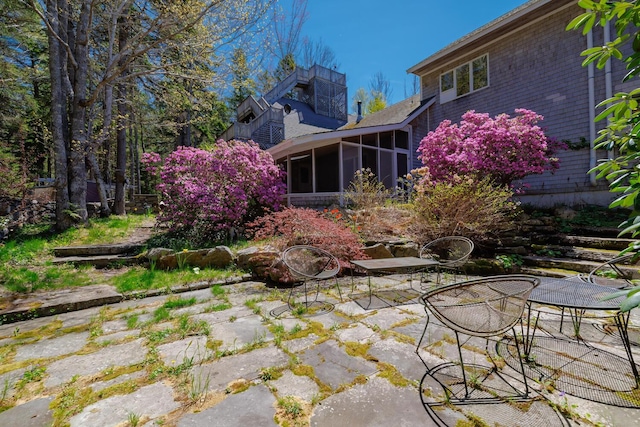 20 Giant Slide Rd, Mount Desert, ME 04660 - rear view of property featuring a sunroom and a patio area