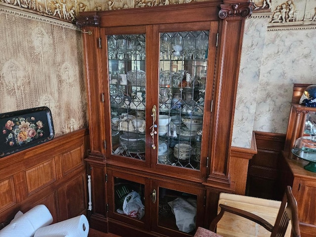 193 N Rd, Detroit, ME 04929 - detailed view of wainscoting, wallpapered walls, and a decorative wall