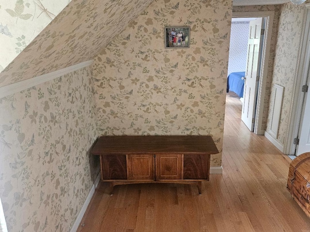 193 N Rd, Detroit, ME 04929 - bonus room with wood-type flooring, wallpapered walls, baseboards, and lofted ceiling