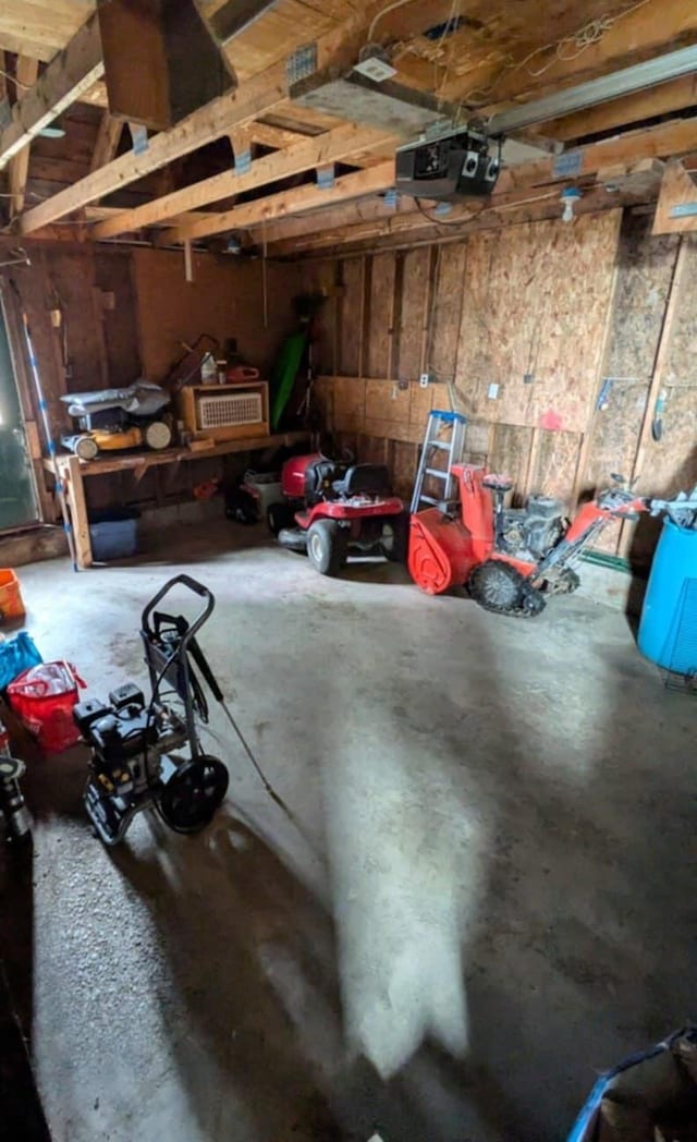 garage featuring a garage door opener