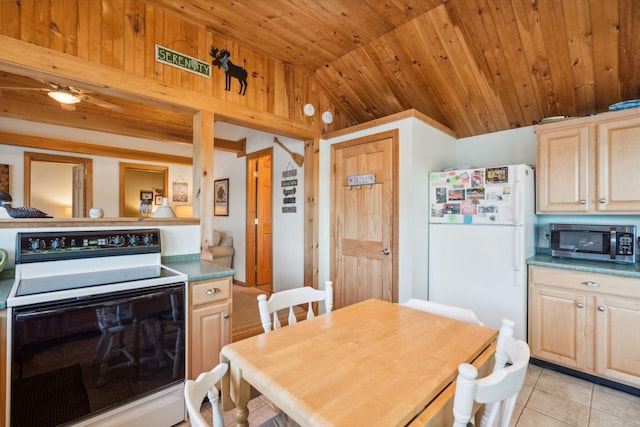 92 Red Gate Ln, Acton, ME 04001 - dining space featuring wood ceiling, light tile patterned flooring, and vaulted ceiling