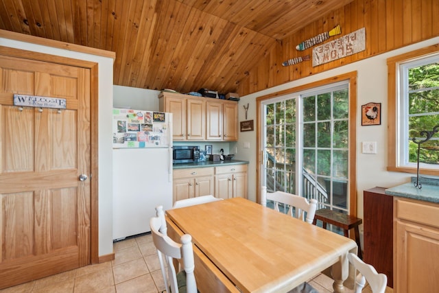 92 Red Gate Ln, Acton, ME 04001 - dining space featuring light tile patterned flooring, vaulted ceiling, and wooden ceiling