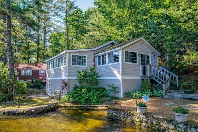 92 Red Gate Ln, Acton, ME 04001 - view of front of home featuring a water view