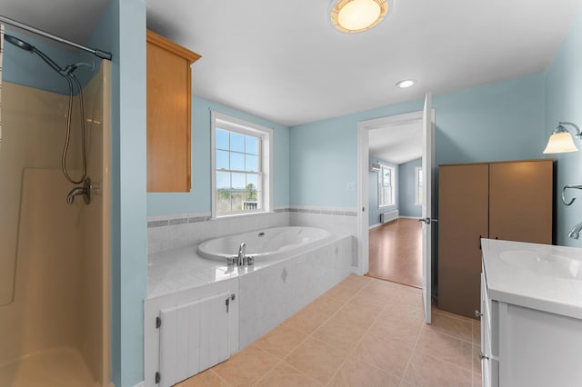 full bath with vanity, tile patterned floors, a bath, and a shower
