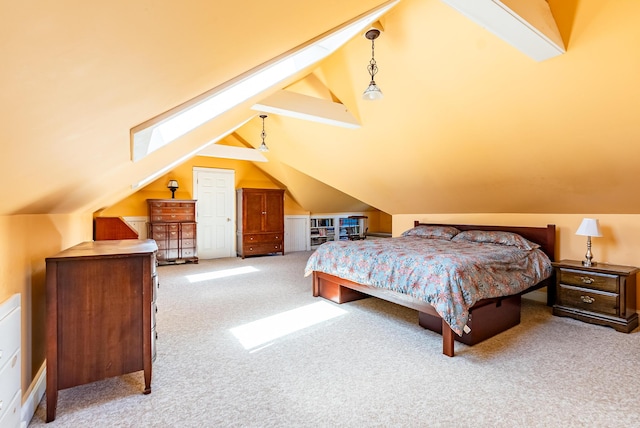 carpeted bedroom featuring vaulted ceiling with beams