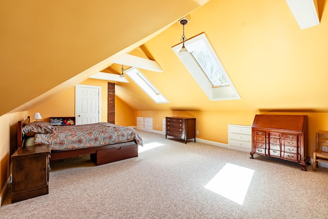 bedroom featuring carpet flooring, baseboards, and vaulted ceiling with skylight