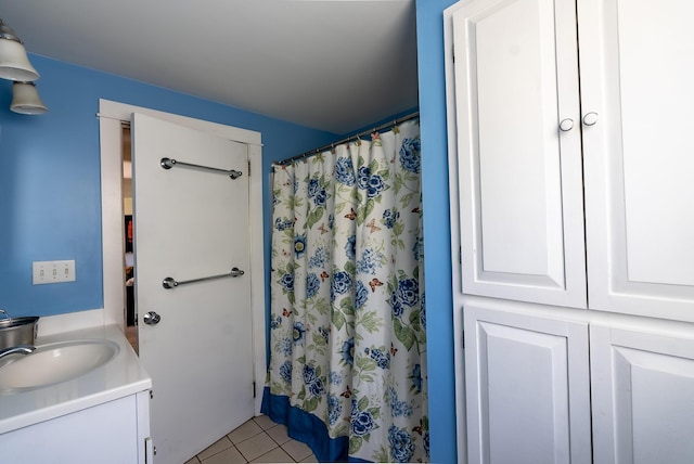 full bath featuring vanity, tile patterned flooring, and a shower with shower curtain