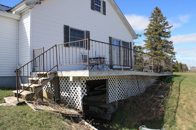 wooden terrace featuring stairway