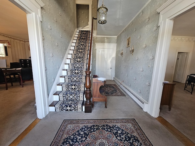 72 Main St, Orono, ME 04473 - stairs with carpet floors, a baseboard radiator, and wallpapered walls