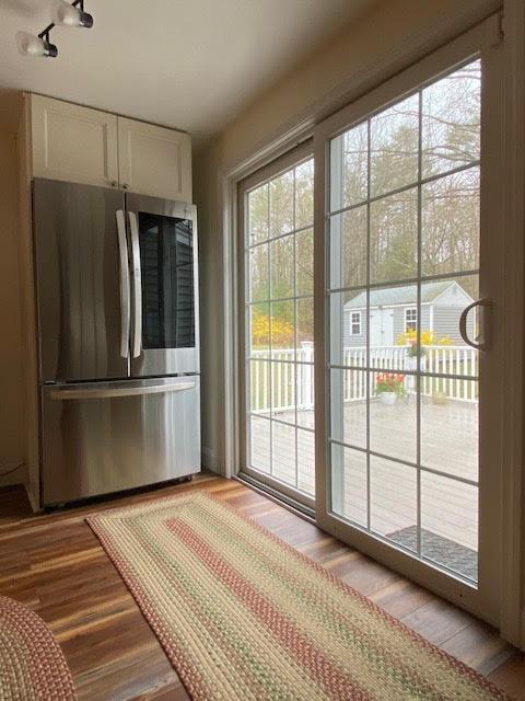 doorway featuring light wood-type flooring