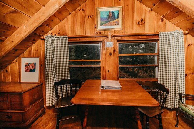 65 Pinecroft Rd, Harrison, ME 04040 - dining area featuring hardwood / wood-style floors, wood walls, wooden ceiling, and an office area