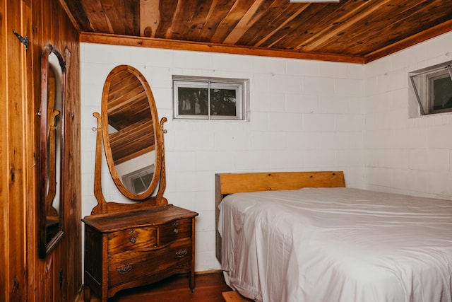 65 Pinecroft Rd, Harrison, ME 04040 - bedroom with wood ceiling and concrete block wall