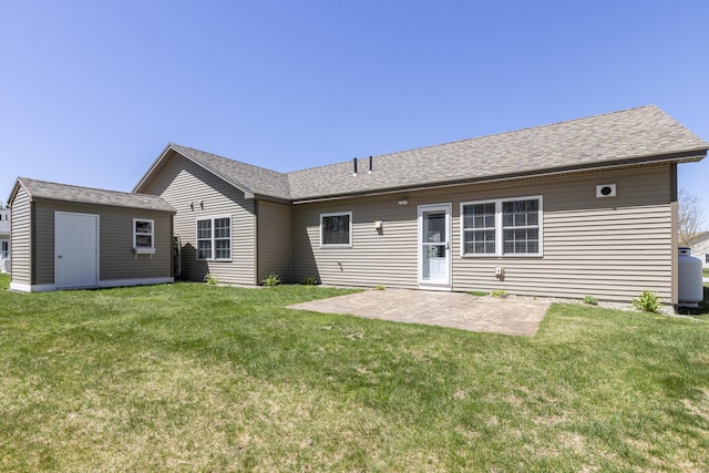 7 Berry Ln Unit 101, Biddeford, ME 04005 - rear view of house featuring a patio area and a lawn