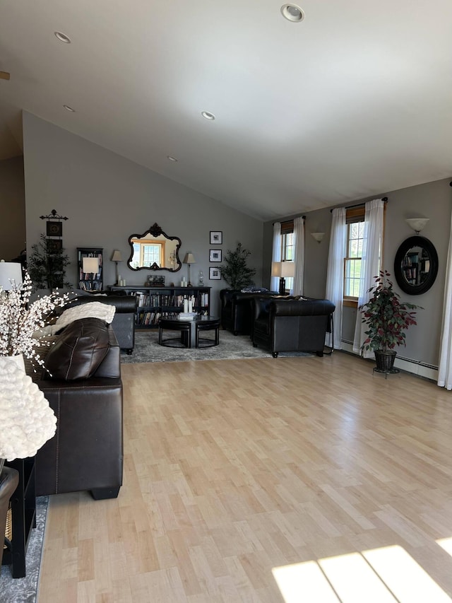 208 N Caribou Rd, Presque Isle, ME 04769 - living area with recessed lighting, vaulted ceiling, and light wood-style flooring