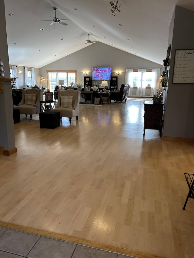 208 N Caribou Rd, Presque Isle, ME 04769 - living room featuring ceiling fan, light wood finished floors, and lofted ceiling