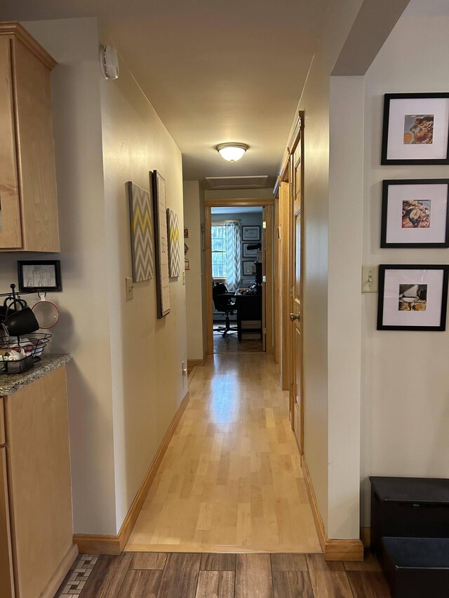 208 N Caribou Rd, Presque Isle, ME 04769 - corridor with baseboards and light wood-type flooring