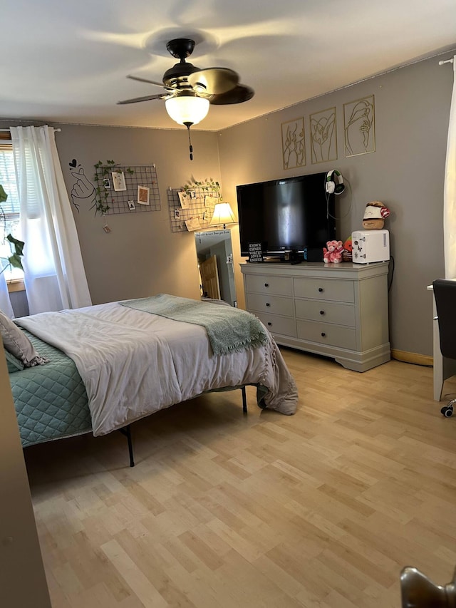 208 N Caribou Rd, Presque Isle, ME 04769 - bedroom featuring light wood-style floors and ceiling fan