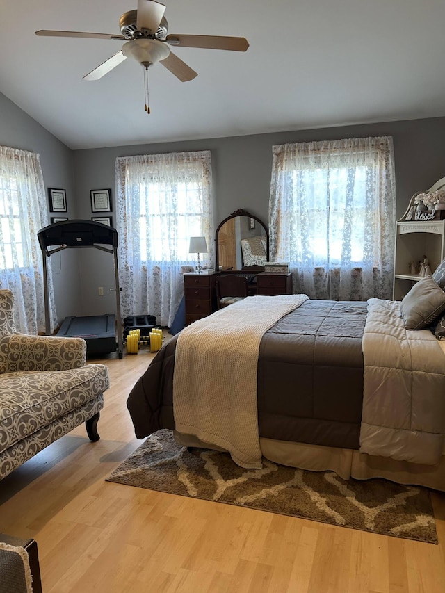 208 N Caribou Rd, Presque Isle, ME 04769 - bedroom with a ceiling fan, vaulted ceiling, and wood finished floors
