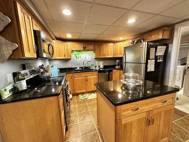 208 N Caribou Rd, Presque Isle, ME 04769 - kitchen with recessed lighting, a sink, dark stone countertops, and stainless steel appliances