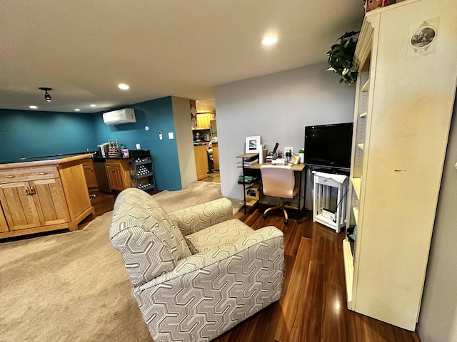 208 N Caribou Rd, Presque Isle, ME 04769 - home office featuring recessed lighting, a wall mounted air conditioner, and wood finished floors