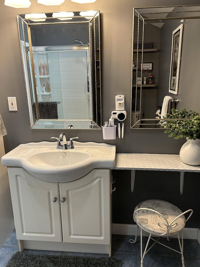 208 N Caribou Rd, Presque Isle, ME 04769 - bathroom with vanity, baseboards, walk in shower, and tile patterned flooring