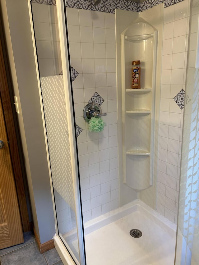 208 N Caribou Rd, Presque Isle, ME 04769 - bathroom with tile patterned flooring and a shower stall