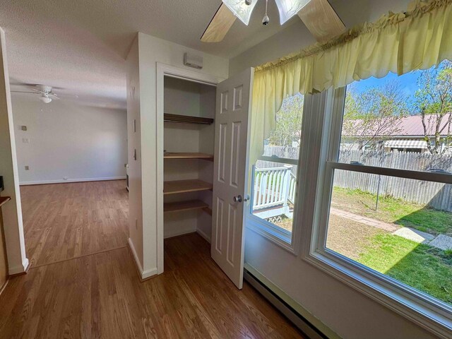 interior space with baseboard heating