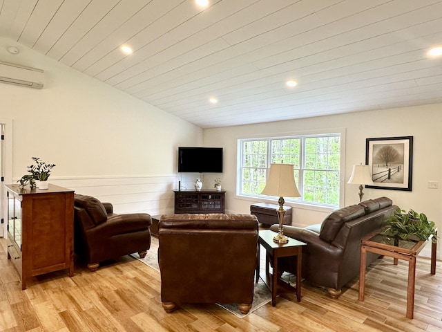 living area with light wood finished floors, a wall mounted air conditioner, recessed lighting, vaulted ceiling, and wood ceiling