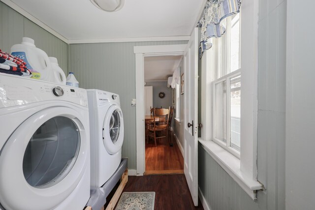 laundry area with dark wood-type flooring and separate washer and dryer