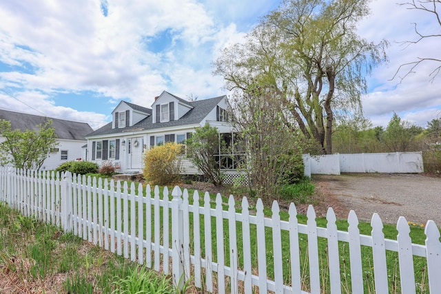 view of new england style home