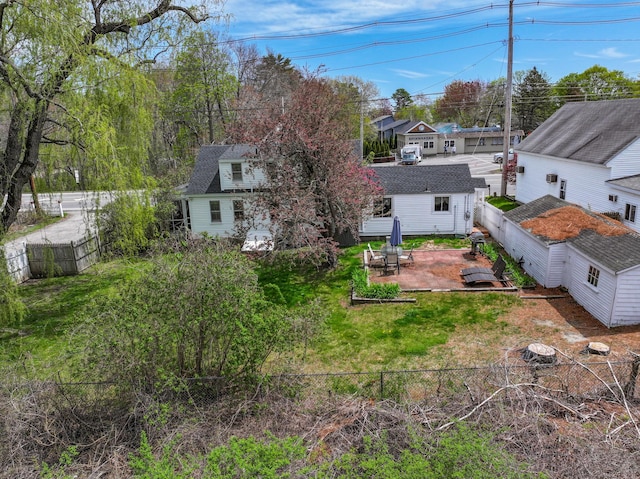 fenced backyard with a patio