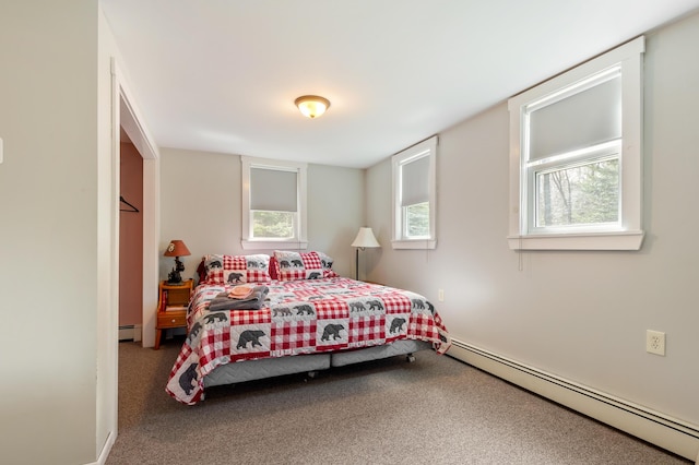 bedroom featuring carpet and baseboard heating