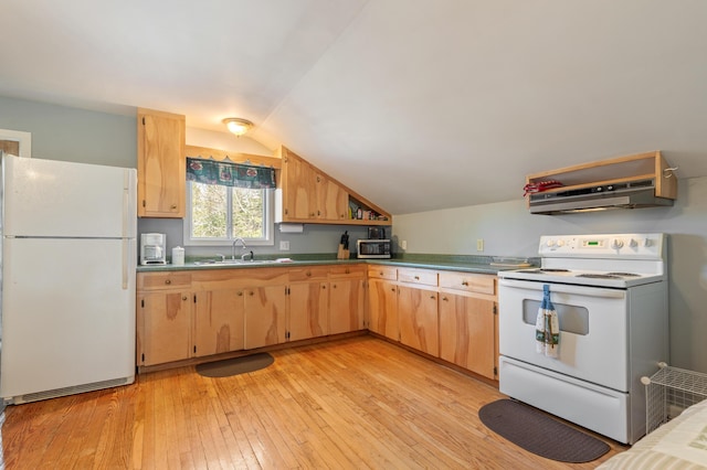 kitchen featuring light brown cabinetry, white appliances, a sink, light wood finished floors, and vaulted ceiling