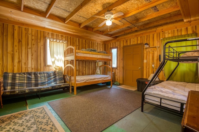bedroom with wooden walls