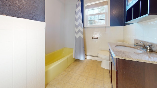 full bath featuring vanity, shower / bath combination with curtain, toilet, tile walls, and a baseboard heating unit