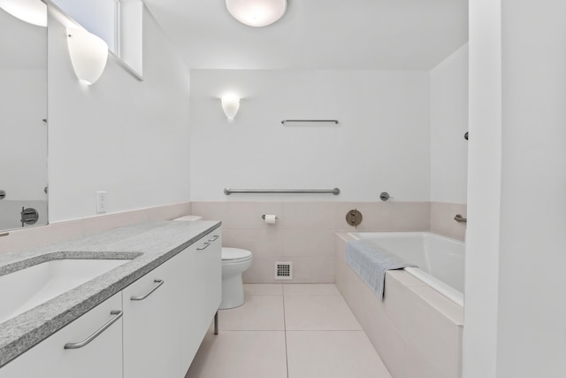 27 Carter Dr, West Bath, ME 04530 - full bathroom with toilet, visible vents, tile patterned floors, vanity, and a garden tub