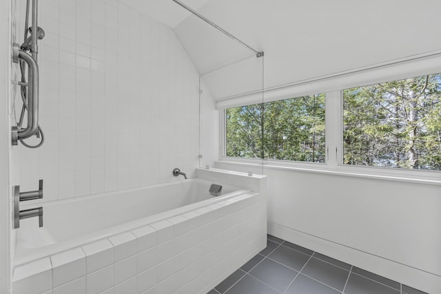 27 Carter Dr, West Bath, ME 04530 - bathroom featuring vaulted ceiling, walk in shower, tile patterned floors, and tiled bath