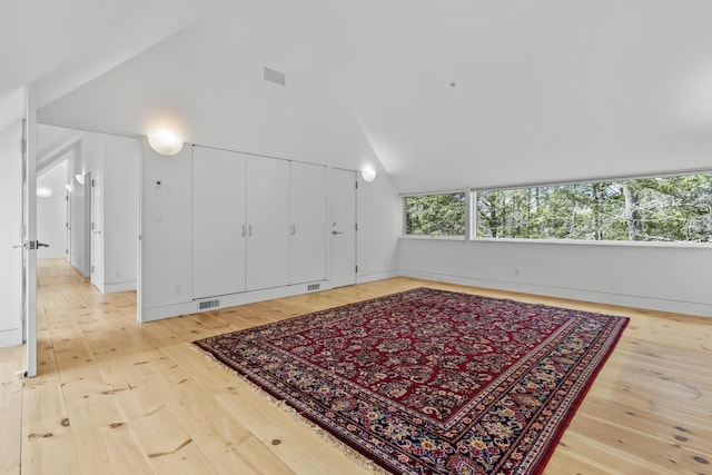 27 Carter Dr, West Bath, ME 04530 - interior space featuring lofted ceiling, visible vents, and light wood-type flooring