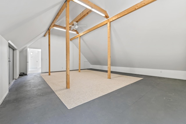 27 Carter Dr, West Bath, ME 04530 - bonus room with finished concrete floors, lofted ceiling, baseboards, and a ceiling fan
