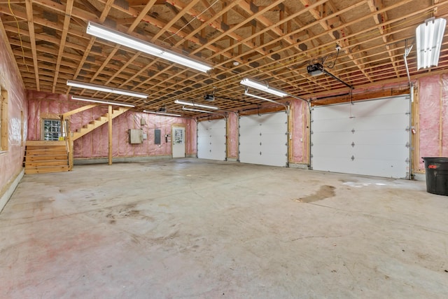 27 Carter Dr, West Bath, ME 04530 - garage with electric panel and a garage door opener