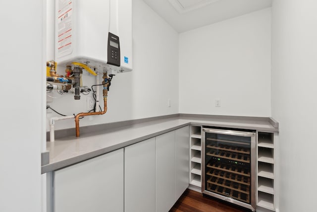 130 Morning St Unit 3A, Portland, ME 04101 - bar featuring wine cooler, water heater, and dark wood-style flooring