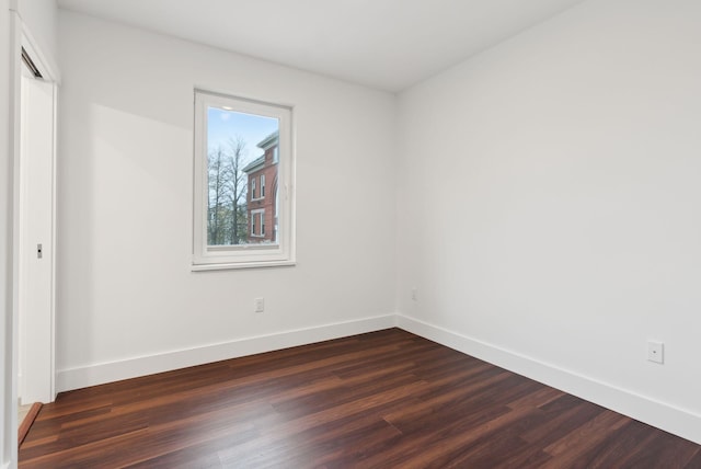130 Morning St Unit 3A, Portland, ME 04101 - unfurnished room featuring dark wood finished floors and baseboards