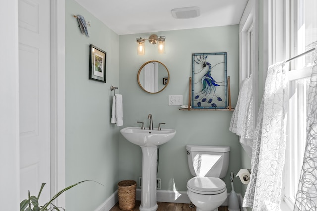 37 Harpswell Islands Rd, Harpswell, ME 04079 - bathroom featuring baseboards and toilet