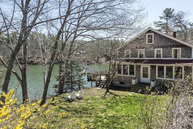 37 Harpswell Islands Rd, Harpswell, ME 04079 - back of house with a deck with water view and a yard