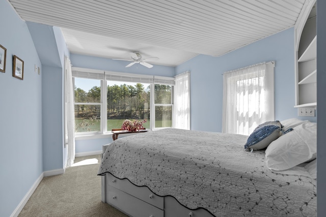 37 Harpswell Islands Rd, Harpswell, ME 04079 - bedroom featuring baseboards, multiple windows, a ceiling fan, and carpet flooring